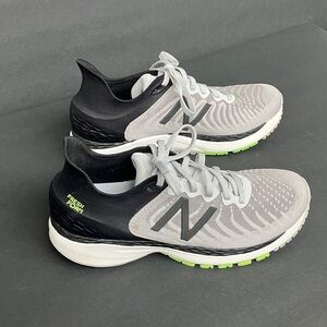 New Balance Gray and Black Athletic Shoes with Green Accents